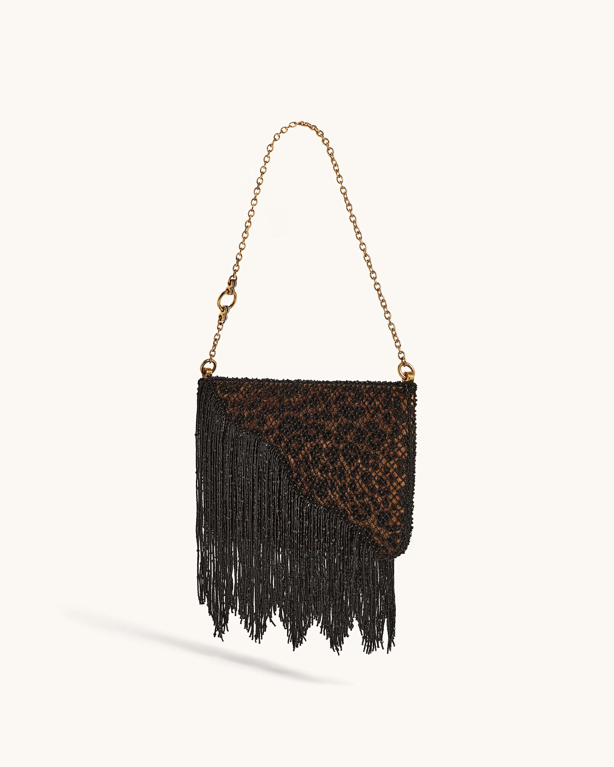 Snap Bag in Leopard Calf Hair paired with Beaded Macramé Veil
